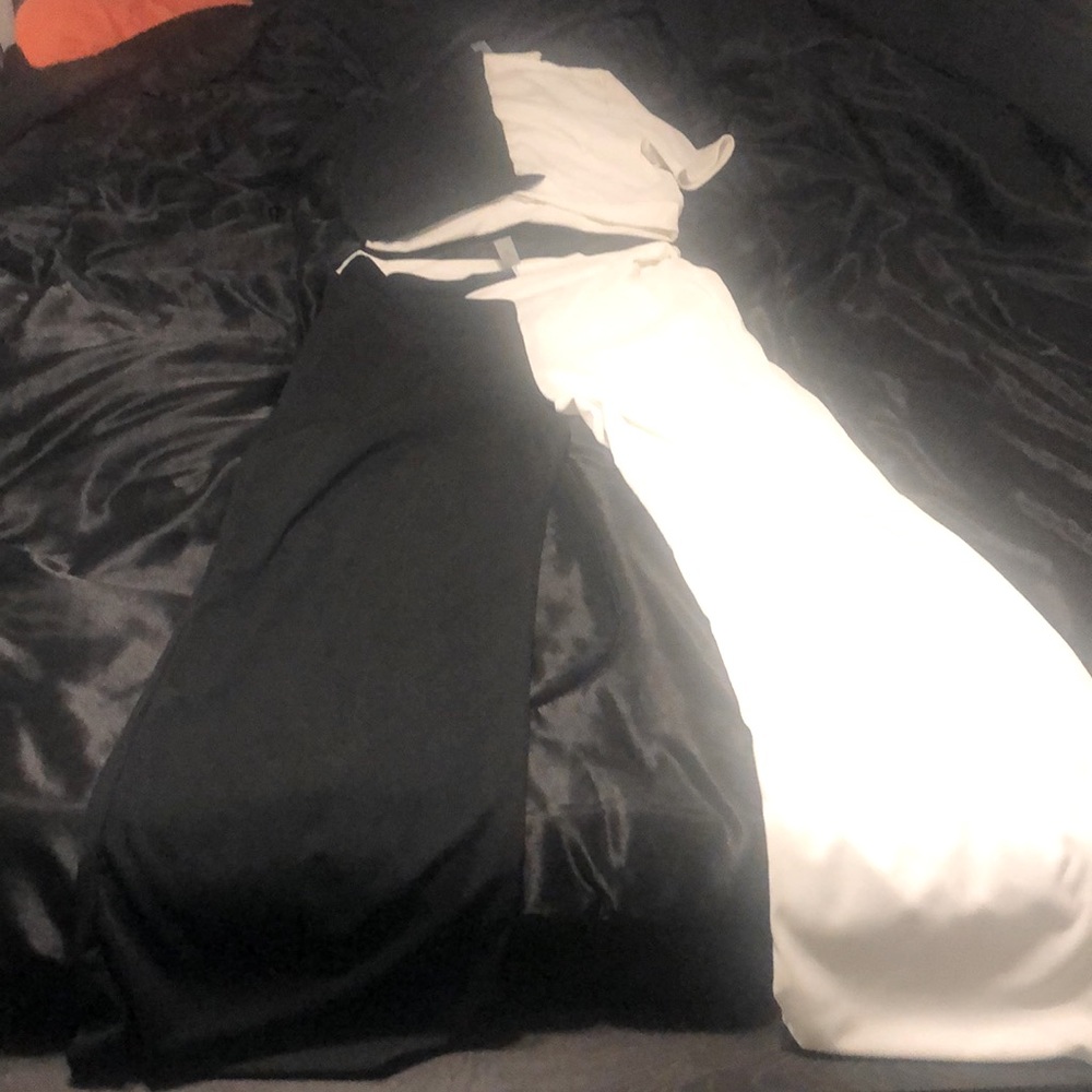 A split black and white 2pc bell bottom set in size 18-20!!Selling for $50!!!